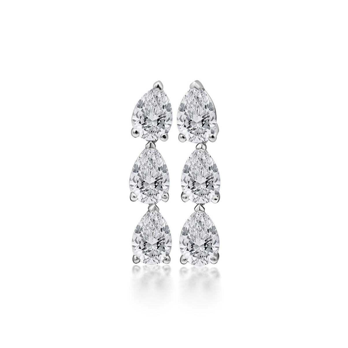 Pair of diamond earrings on a white background