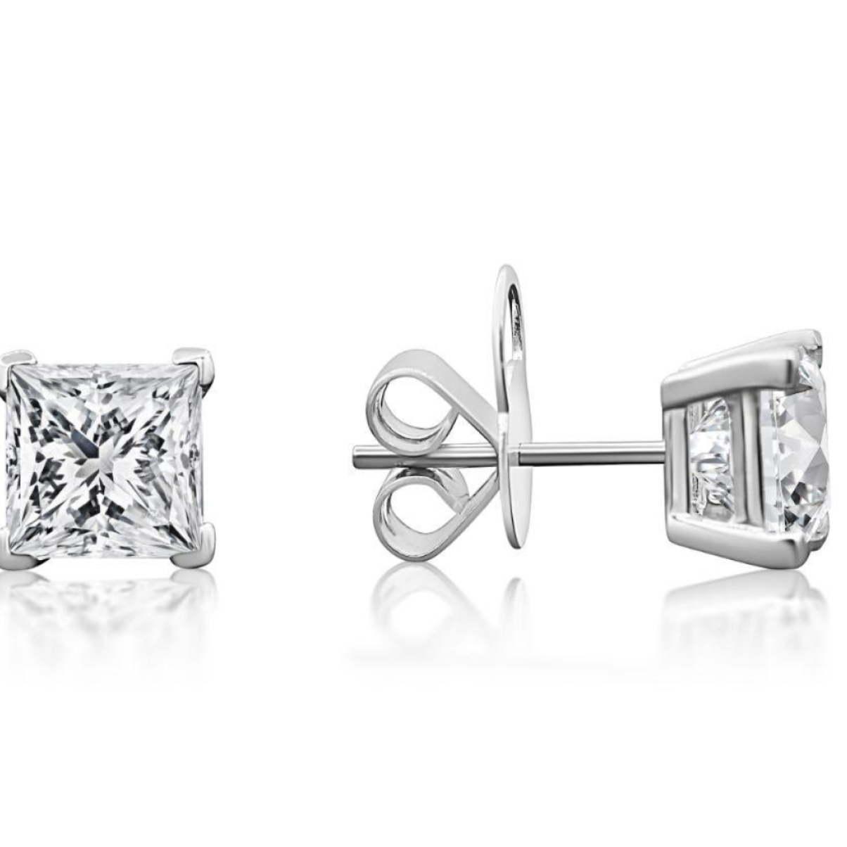 Pair of diamond stud earrings on a white background