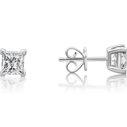 Pair of diamond stud earrings on a white background